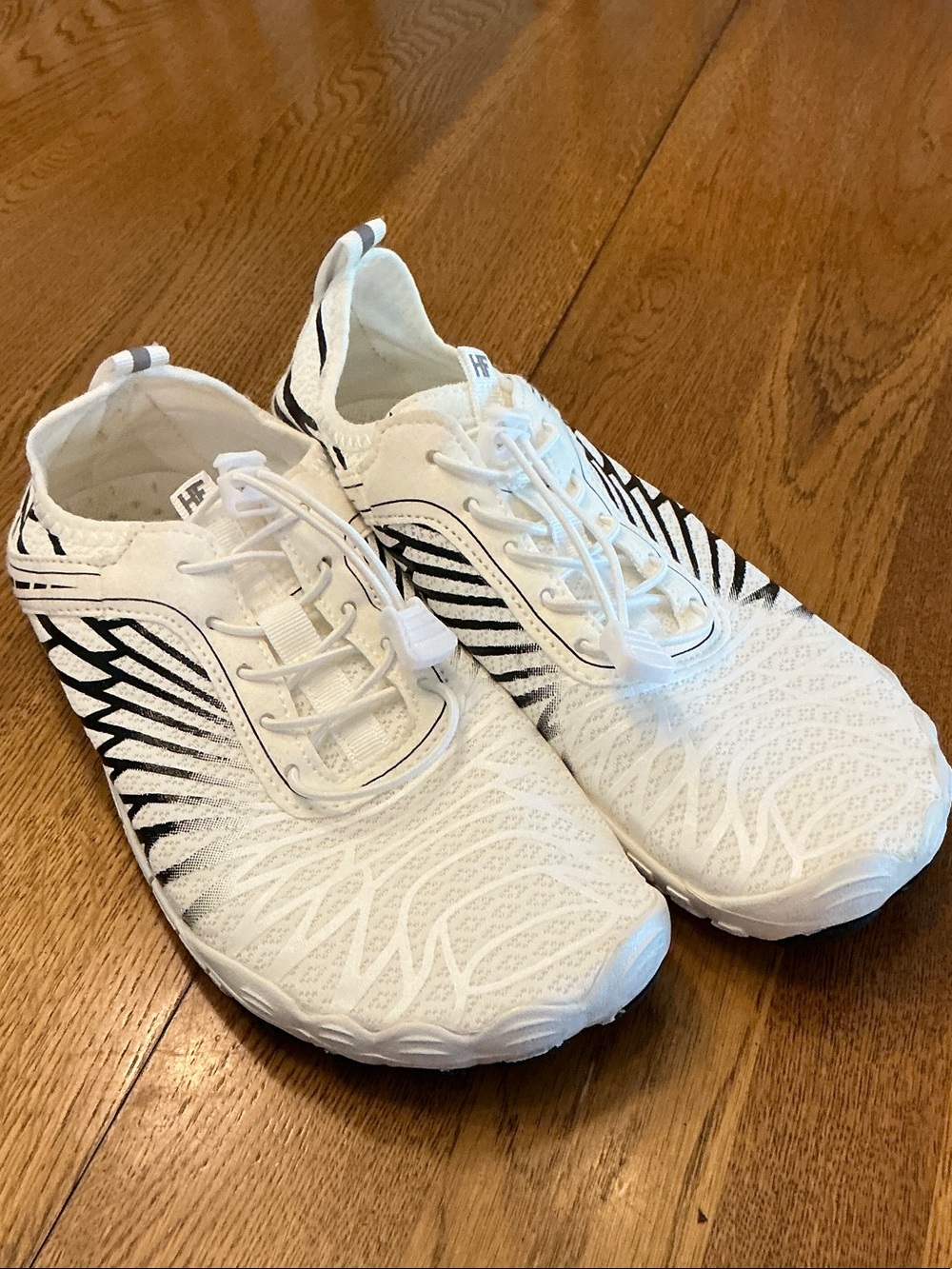 Woman’s HF Active black/white barefoot shoes. Size 40. Barely worn. Like new!